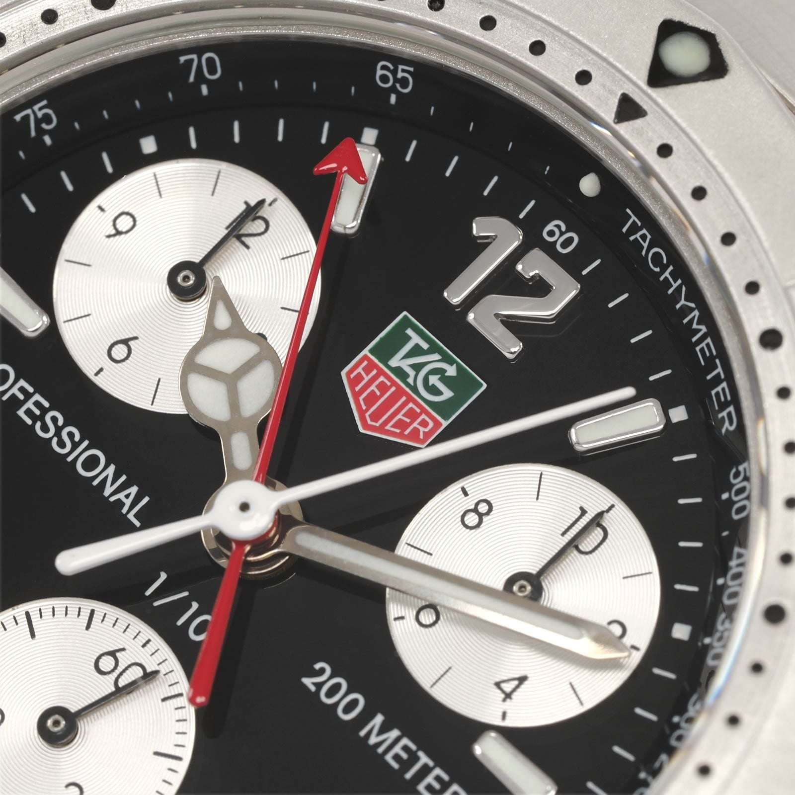 TAG Heuer 2000 Chronograph CK1110-0 logo close up