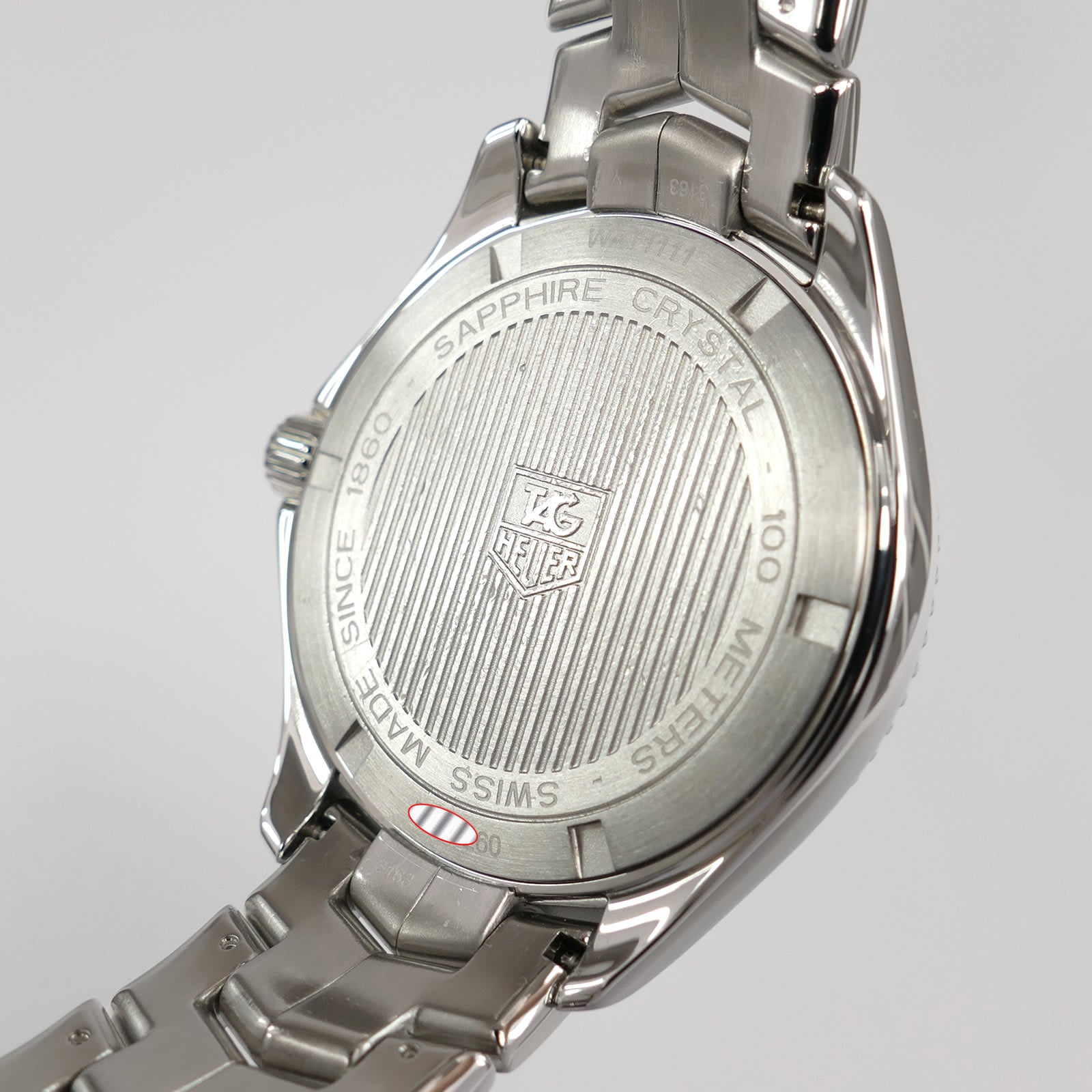TAG Heuer Link WAT1111 stainless steel screw down case back