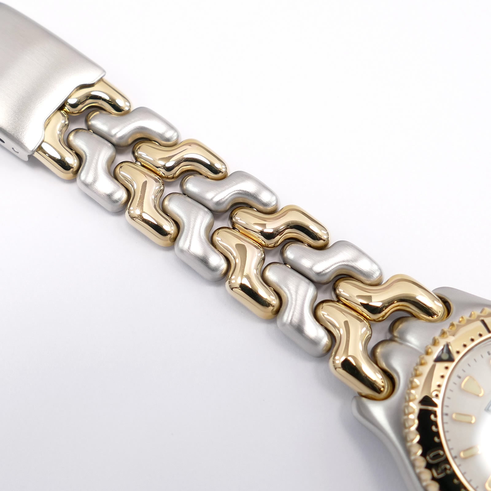 TAG Heuer SEL WG1322-2 alternating stainless steel and 18k gold plated s-link BB0471-MO bracelet top