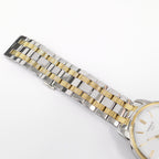 Tissot Automatic III T065430A stainless steel and gold pvd bracelet top
