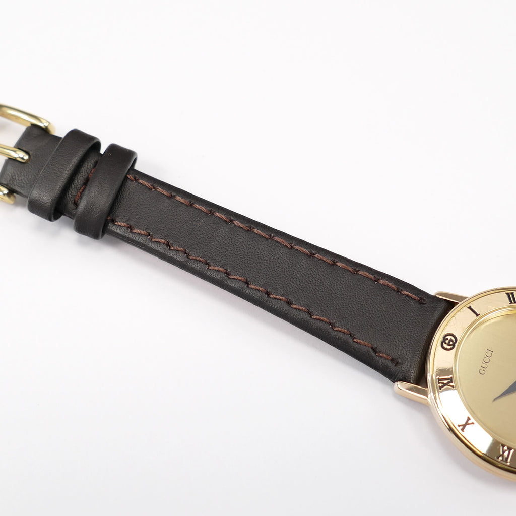 Gucci 3001 L brown leather strap top