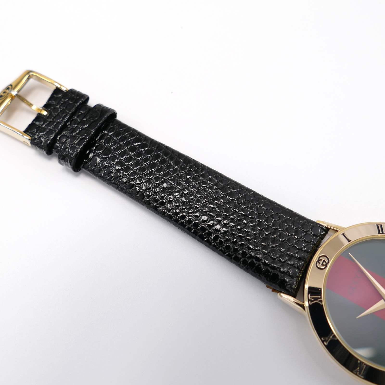 Gucci 3000M black leather strap top