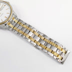 Tissot Automatic III T065430A stainless steel and gold pvd bracelet bottom
