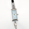 Gucci 1500L Blue Dial Ladies 12mm Rectangular Watch on 16.5cm Bangle S. Steel