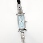 Gucci 1500L Blue Dial Ladies 12mm Rectangular Watch on 16.5cm Bangle S. Steel