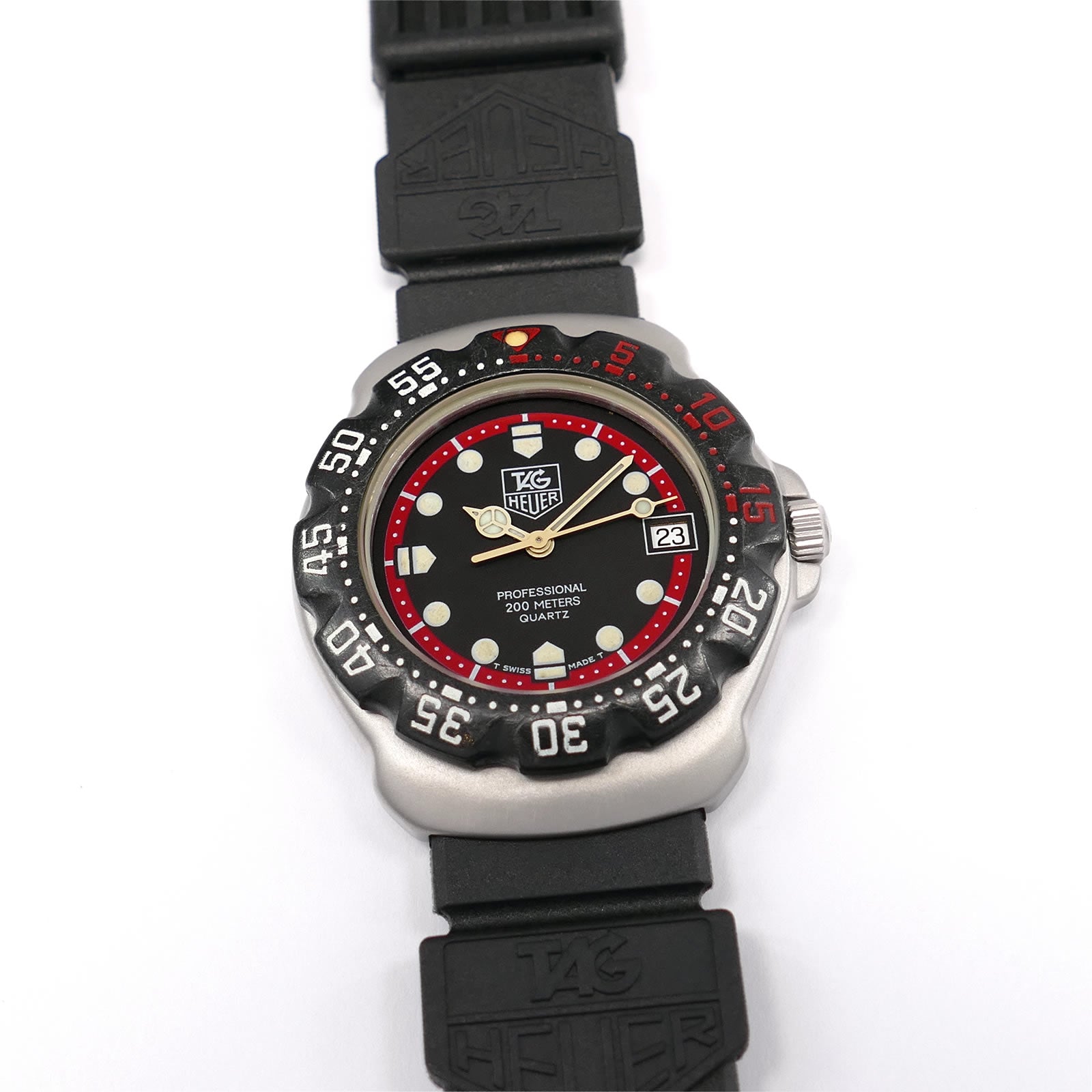TAG Heuer Formula 1 Black & Red Dial 374.513 New Strap Mid Size Men's 35mm F1
