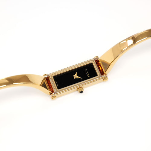 Gucci 1500L Ladies Black Rectangular Dial 18k Gold Plated Bangle watch