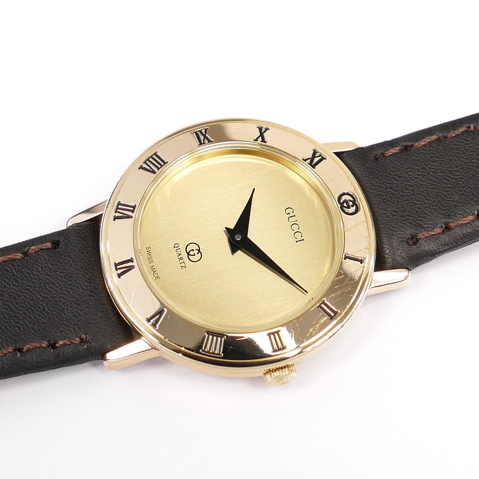 Gucci 3001 L Champagne Dial Roman Numeral Bezel