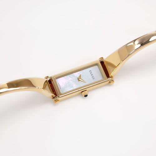 Gucci 1500L Ladies White Mother of Pearl Dial 18k Gold Plated rectangular bangle watch