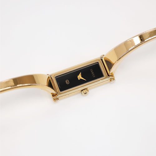 Gucci 1500L Ladies Black Rectangular Dial 18k Gold Plated Bangle watch