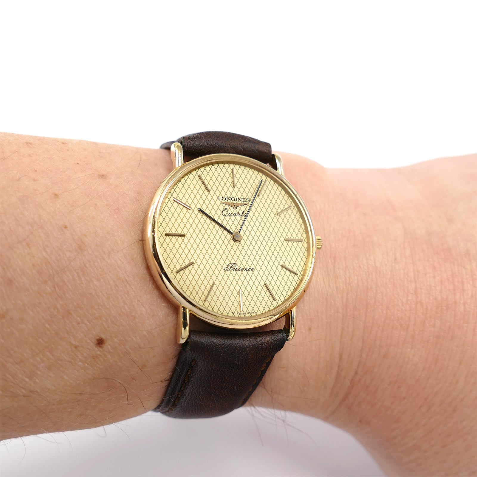 Longines Présence 18k Gold Plated Champagne dial on the wrist