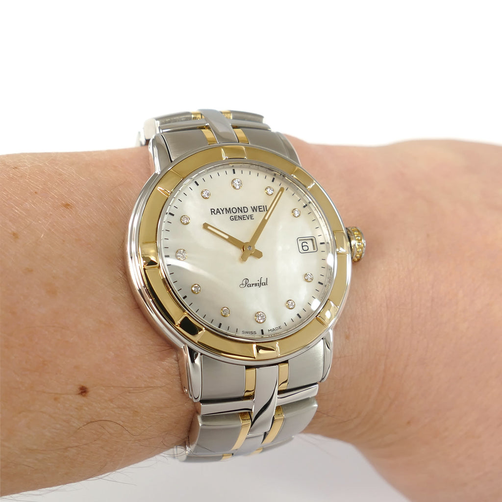 Raymond Weil Parsifal 9540 Mother of Pearl 18k Gold diamonds on wrist