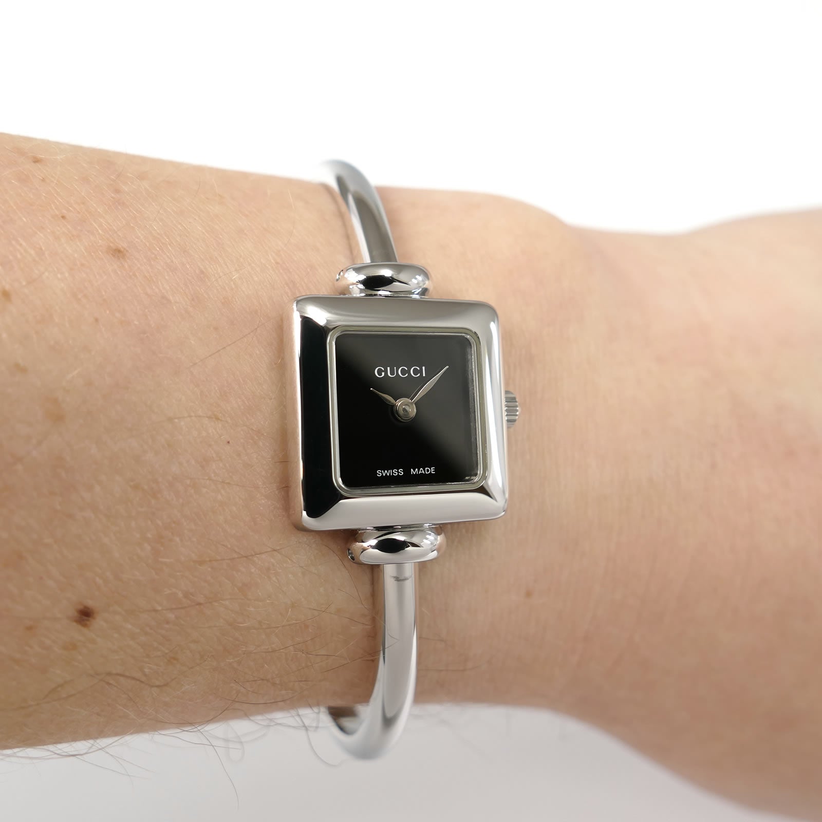 Gucci 1900L Black Dial Bangle Stainless Steel on the wrist