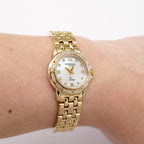 Raymond Weil Tango 5860 White Mother of Pearl 18k Gold Plated on the wrist