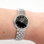 Movado Faceto 0605586 Black Dial on the wrist