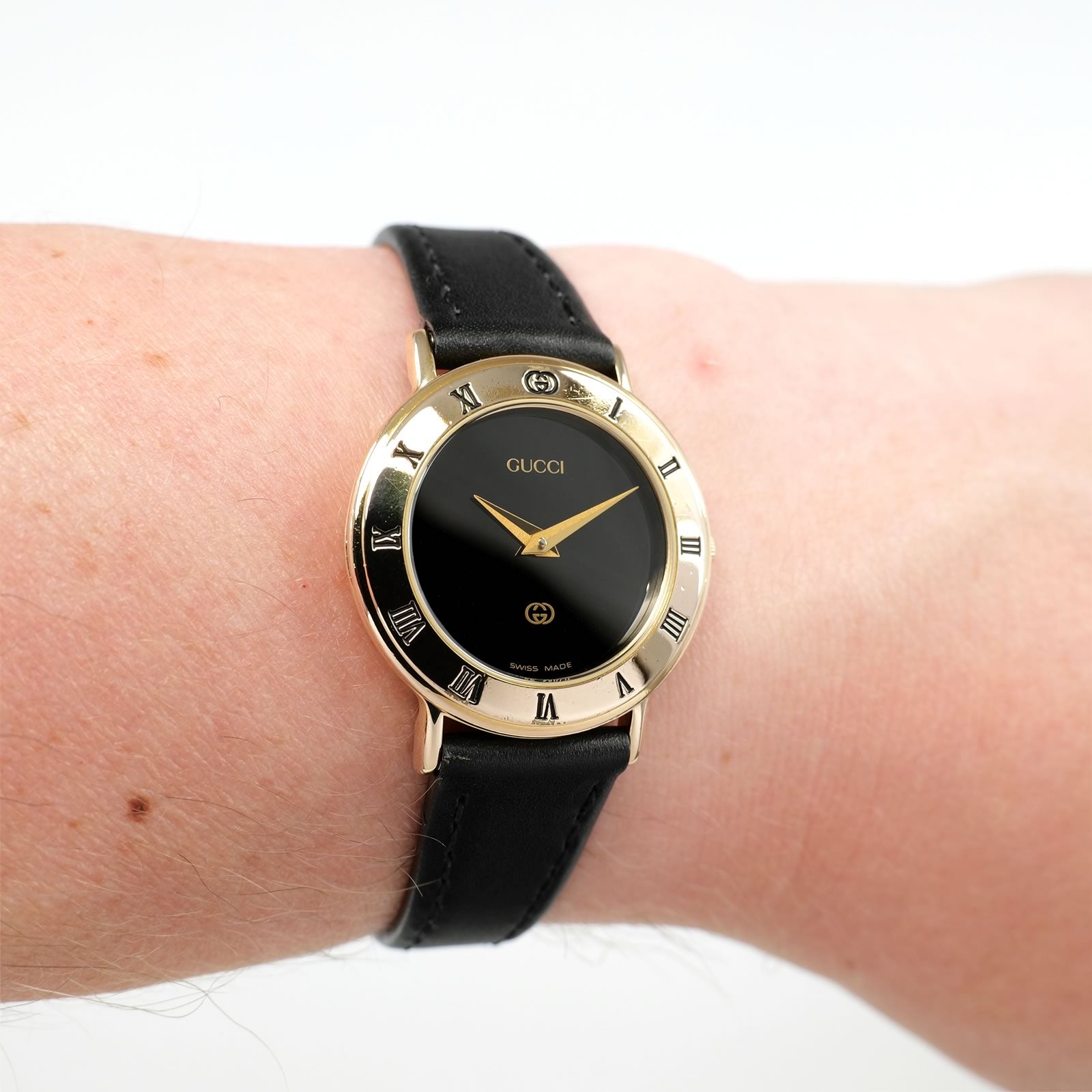 Gucci 3000L Black Dial 18k Gold Plated on the wrist