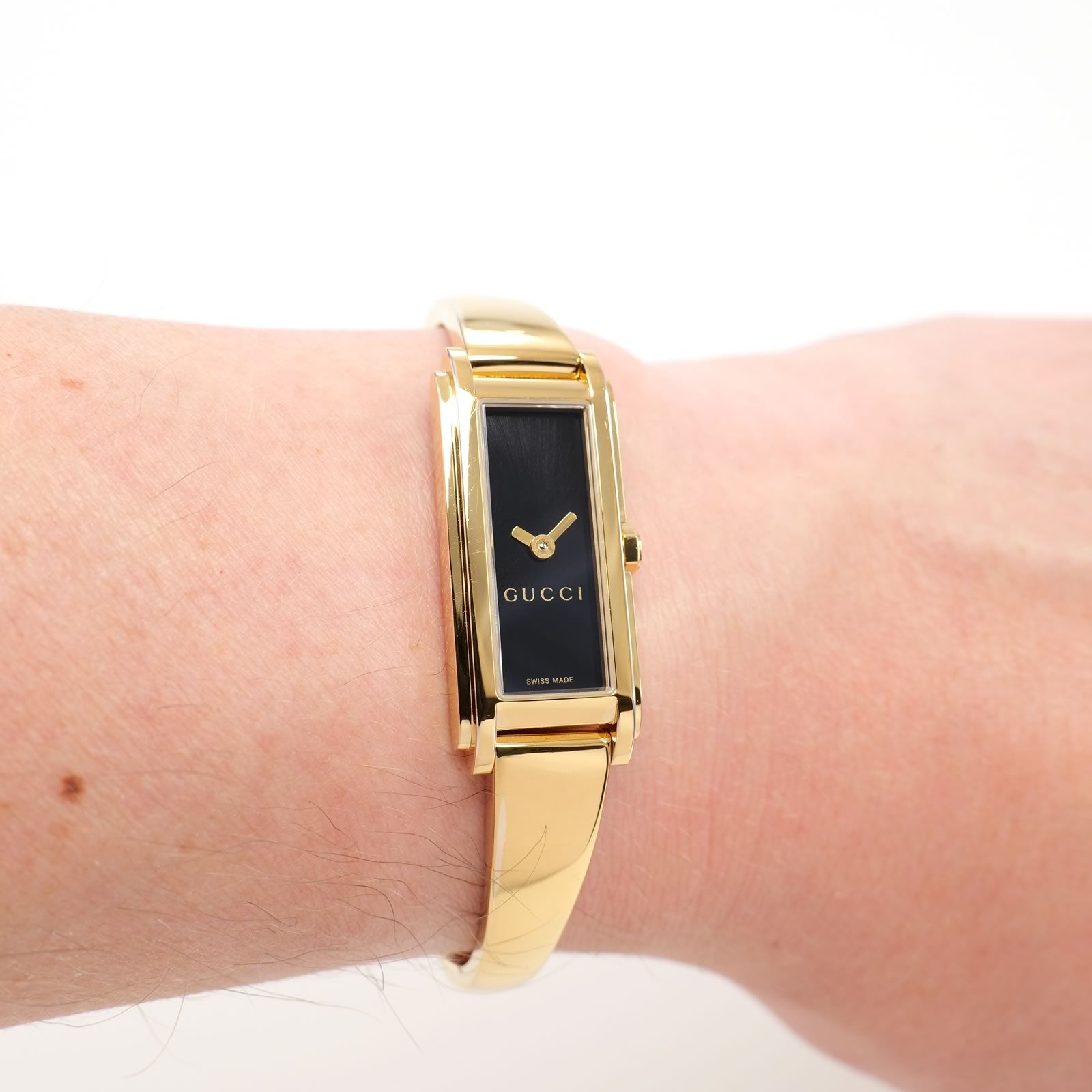 Gucci G-Line 109 Black Dial 18k Gold Plated on the wrist
