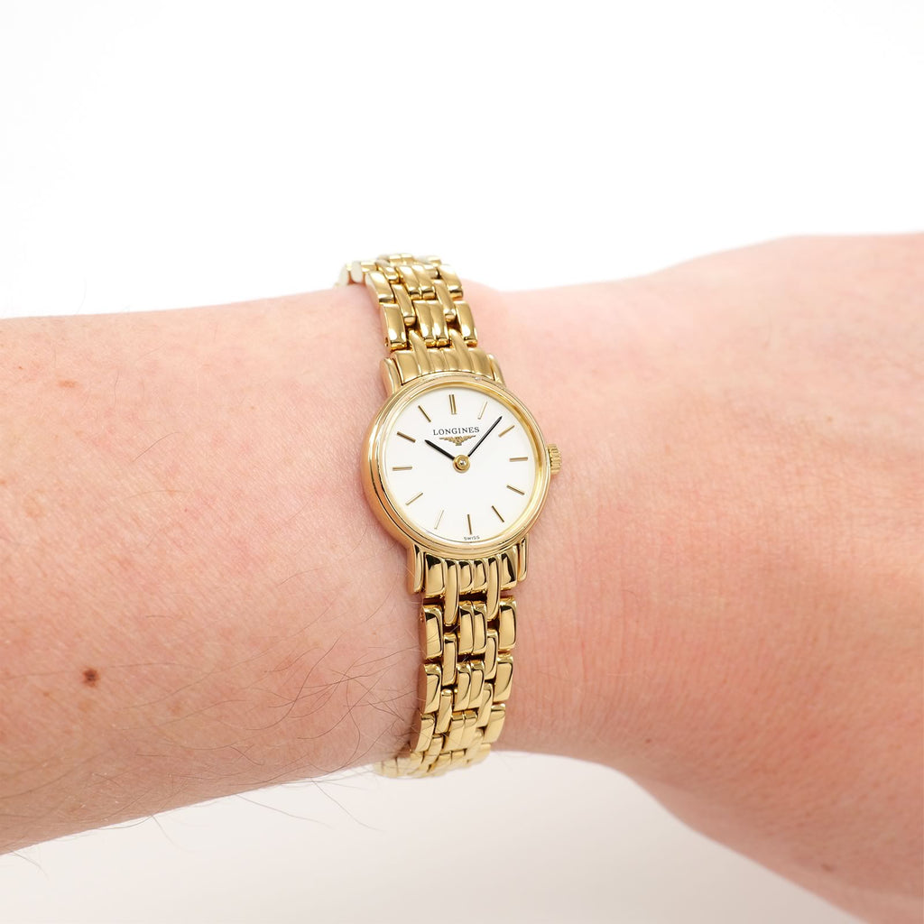 Longines Présence L4.219.2 White Dial Gold PVD on the wrist