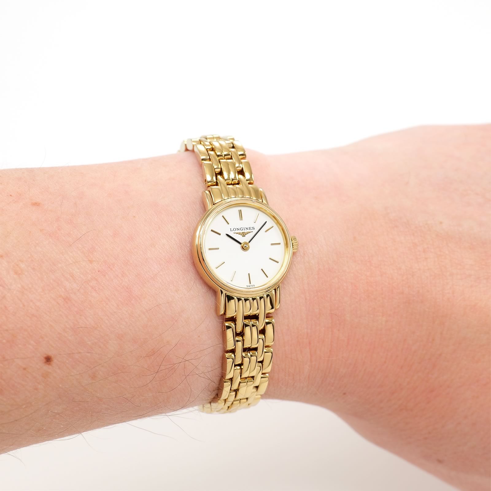 Longines Présence L4.219.2 White Dial Gold PVD on the wrist