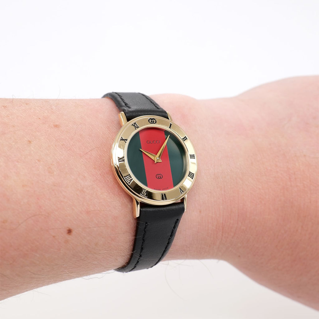 Gucci 3000L Red and Green Dial 18k Gold Plated on the wrist
