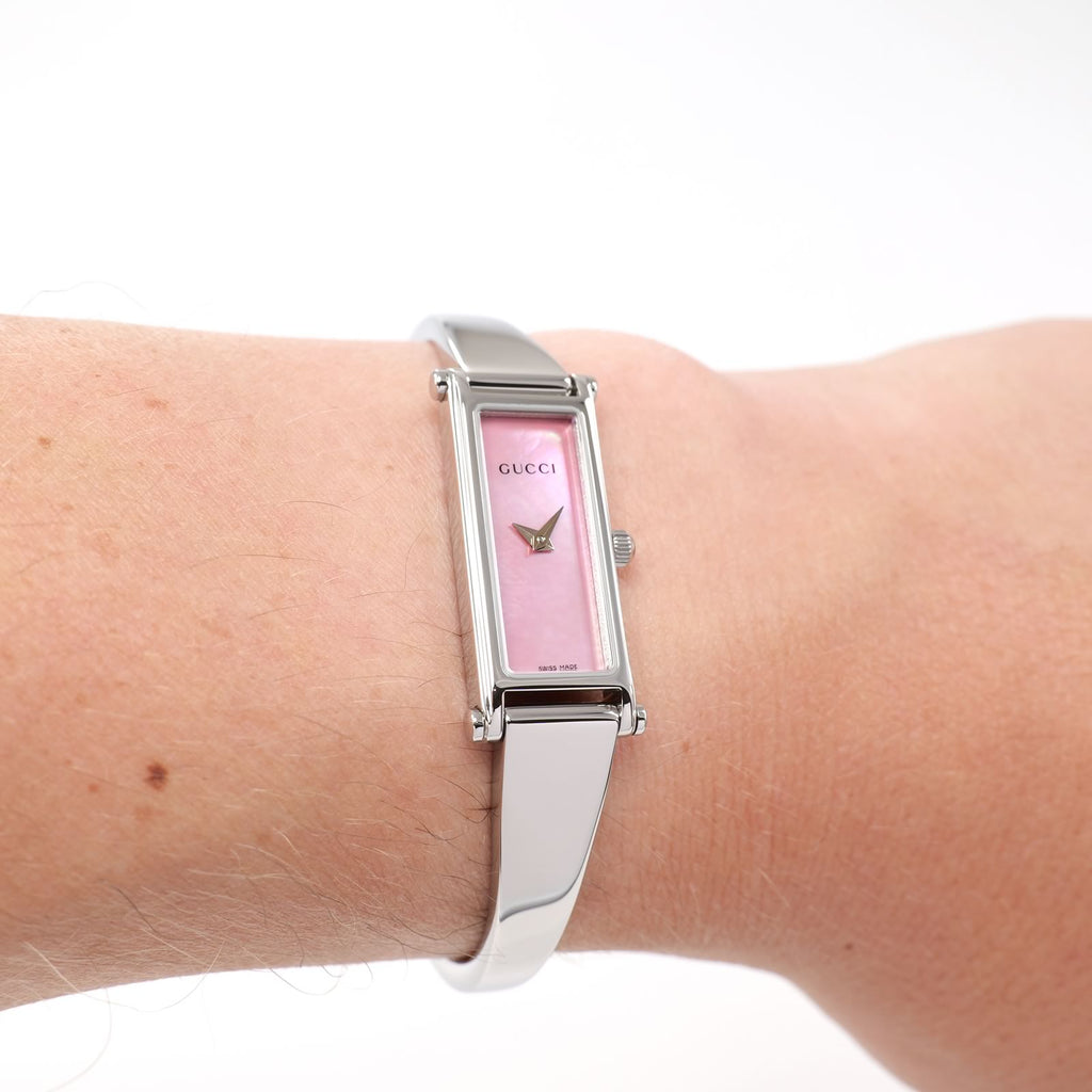 Gucci 1500L Ladies Pink Mother of Pearl Bangle Watch on the wrist
