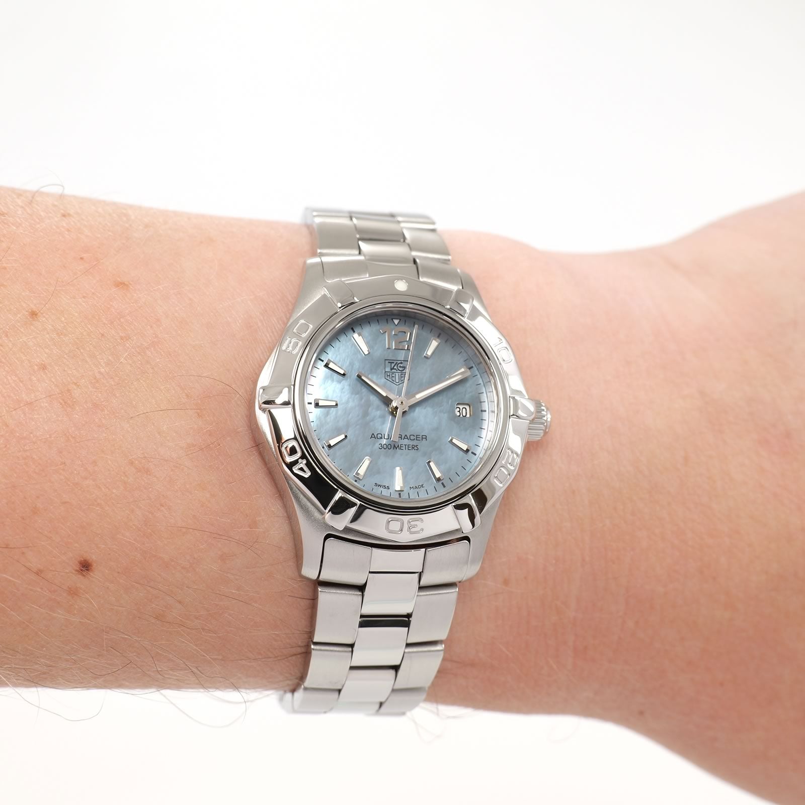TAG Heuer Aquaracer WAF1417 Ladies Blue Mother of Pearl Dial watch on the wrist