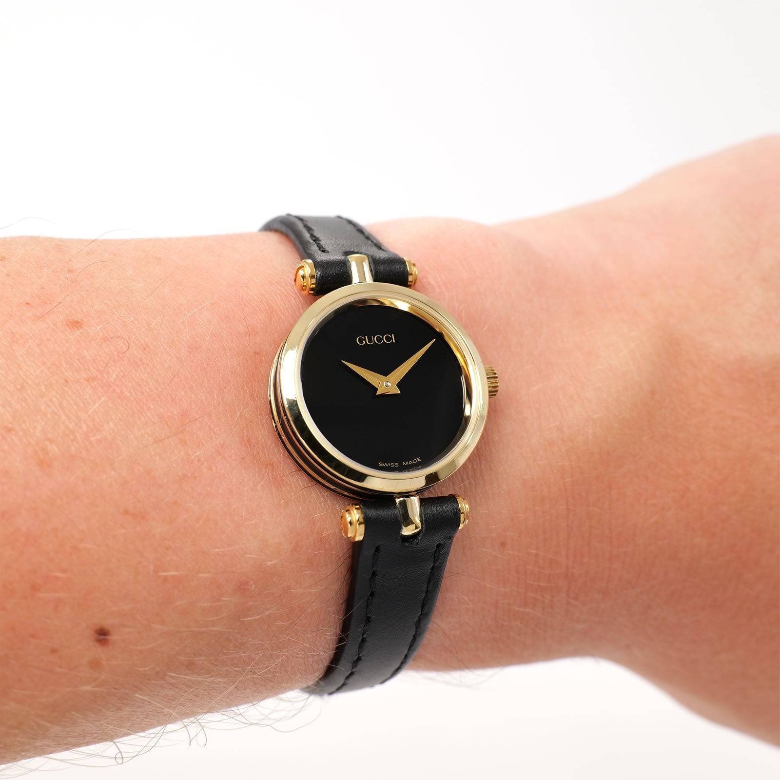 Gucci 2000L Black Dial 18k Gold Plated on the wrist