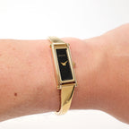 Gucci 1500L Black Dial 18k Gold Plated on the wrist