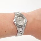 TAG Heuer Aquaracer WAF1412 Silver Sunburst Dial on the wrist