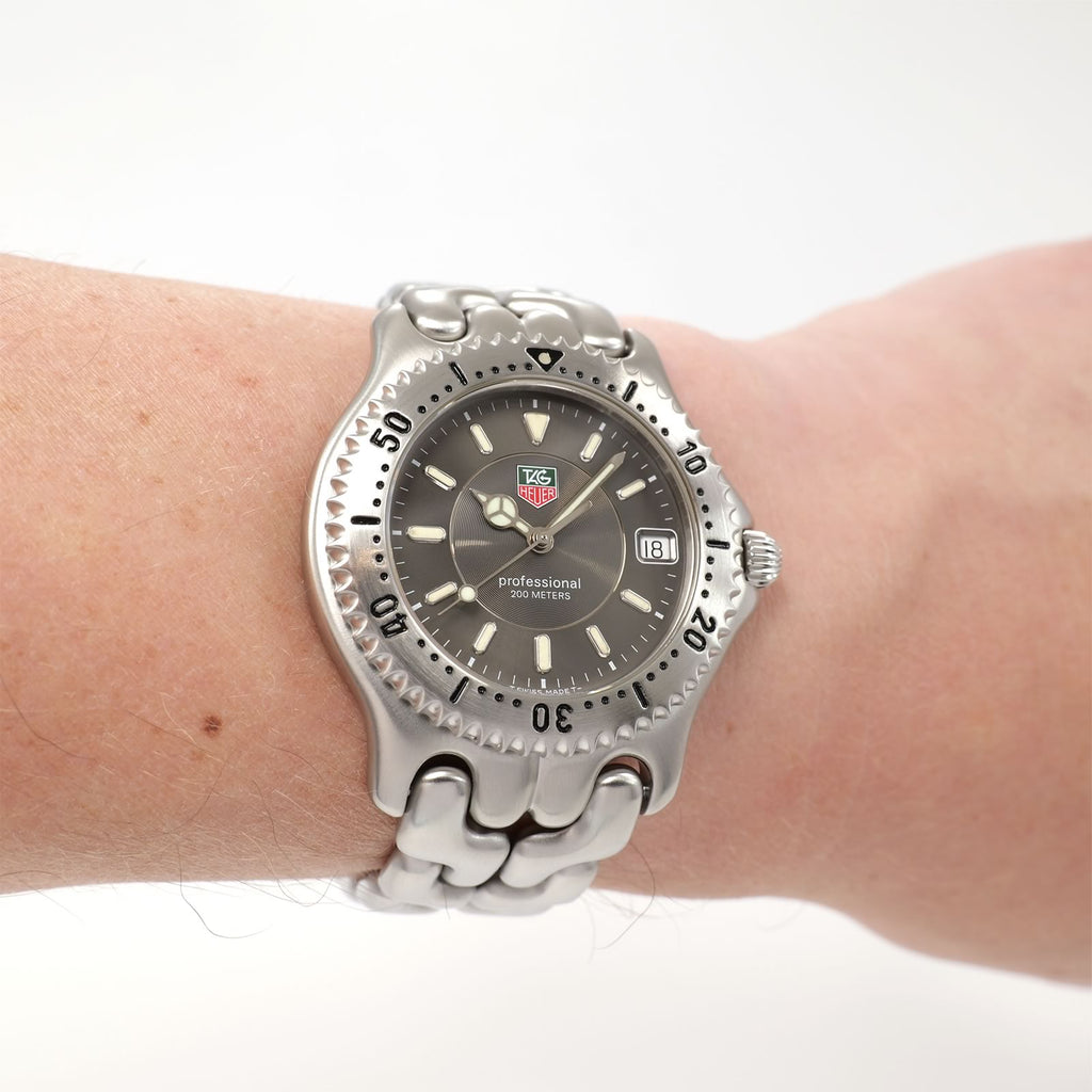 TAG Heuer SEL Grey Dial Men's watch on the wrist
