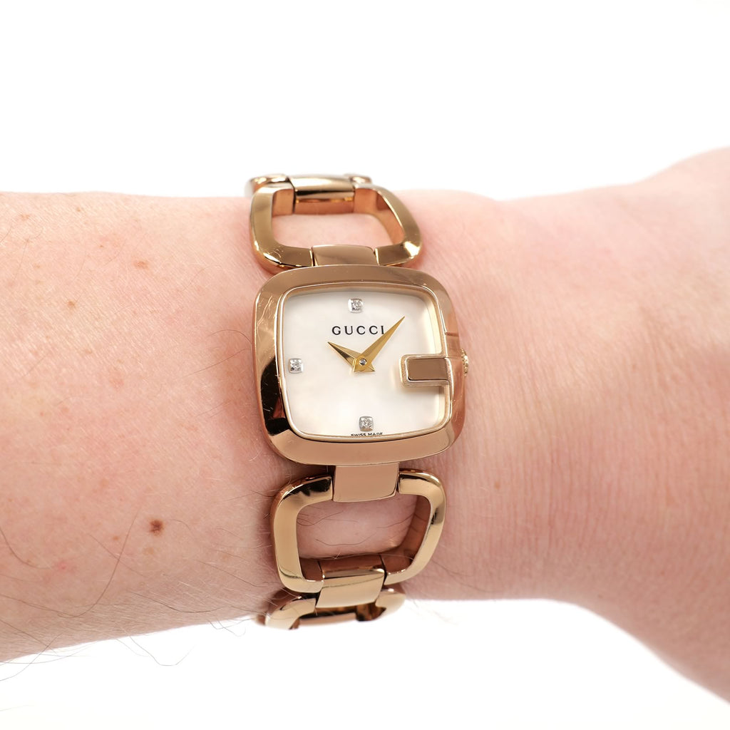 Gucci G Rose Gold 125.5 ladies white dial rose gold watch on the wrist