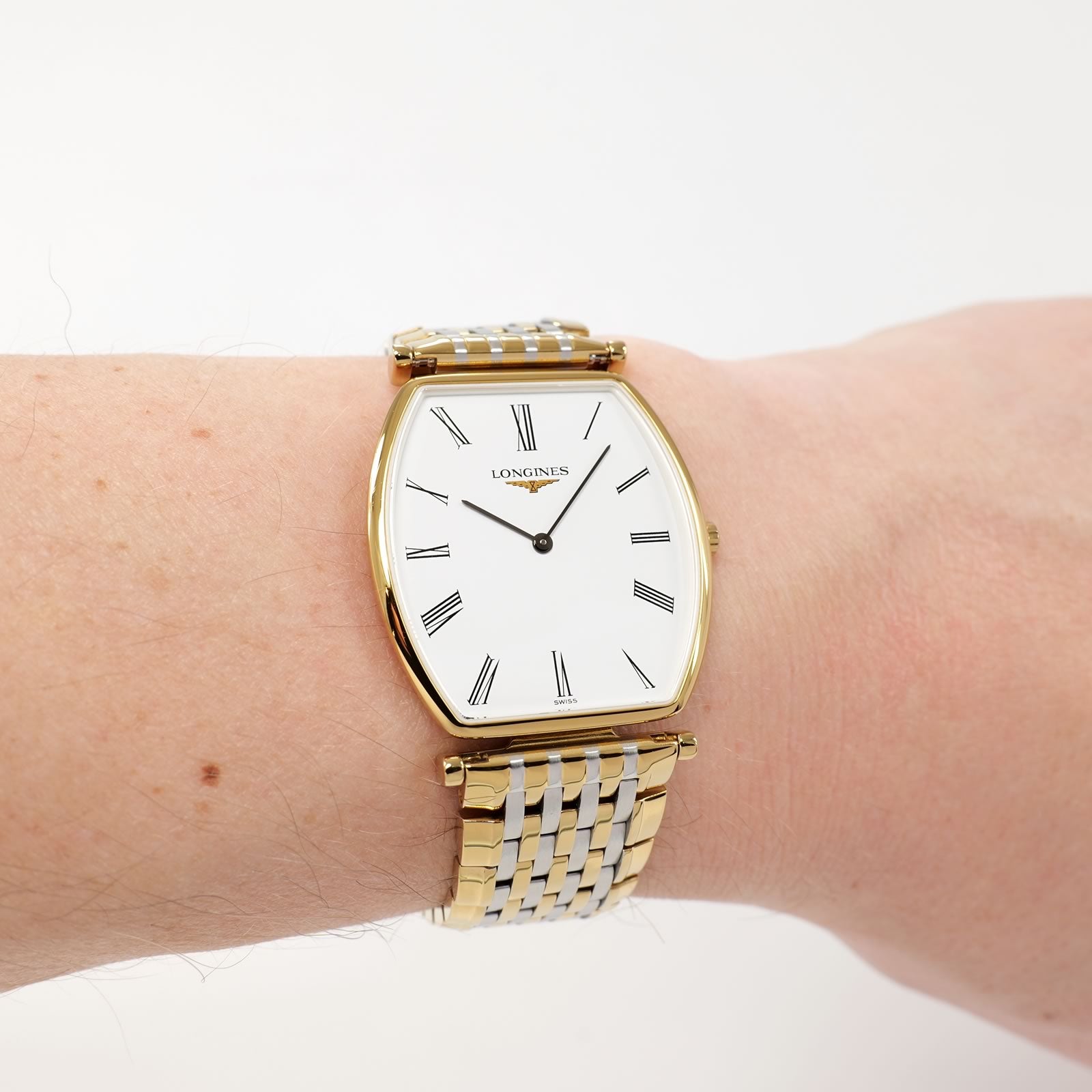 Longines La Grande Classique L4.705.2 White Dial Tonneau Gold PVD on the wrist