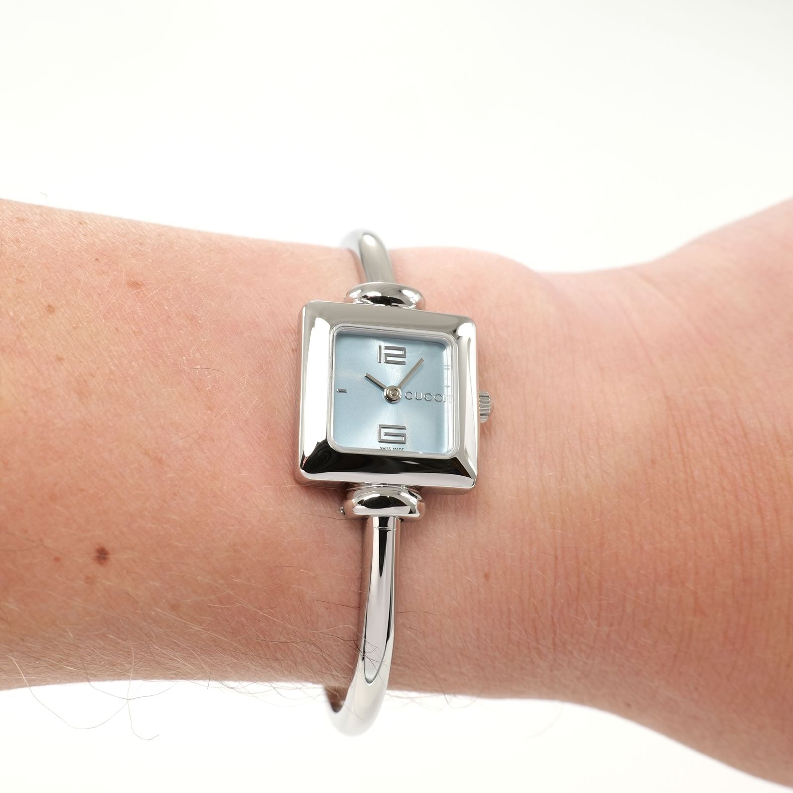 Gucci 1900L Ladies Blue Dial Square Watch on the wrist