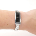 Gucci G-Frame 127.5 Ladies Black dial watch on the wrist