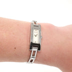 Gucci 3900L Ladies White Mother of Pearl Rectangular watch on the wrist