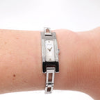 Gucci 3900L Ladies White Mother of Pearl Rectangular watch on the wrist