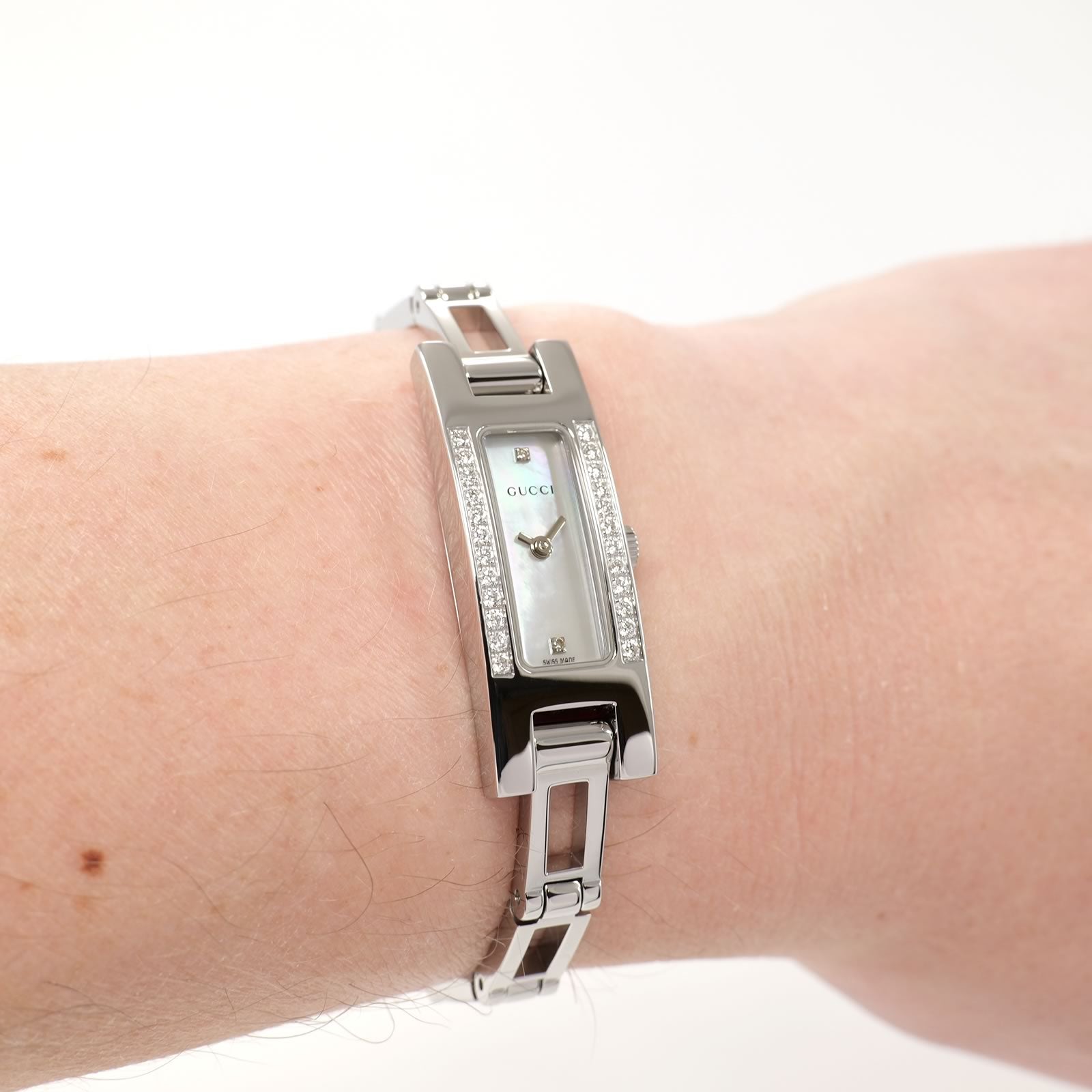 Gucci 3900L White Mother of Pearl Rectangular watch on the wrist