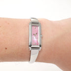 Gucci G-Line 109 Ladies Pink Mother of Pearl Rectangular watch on the wrist