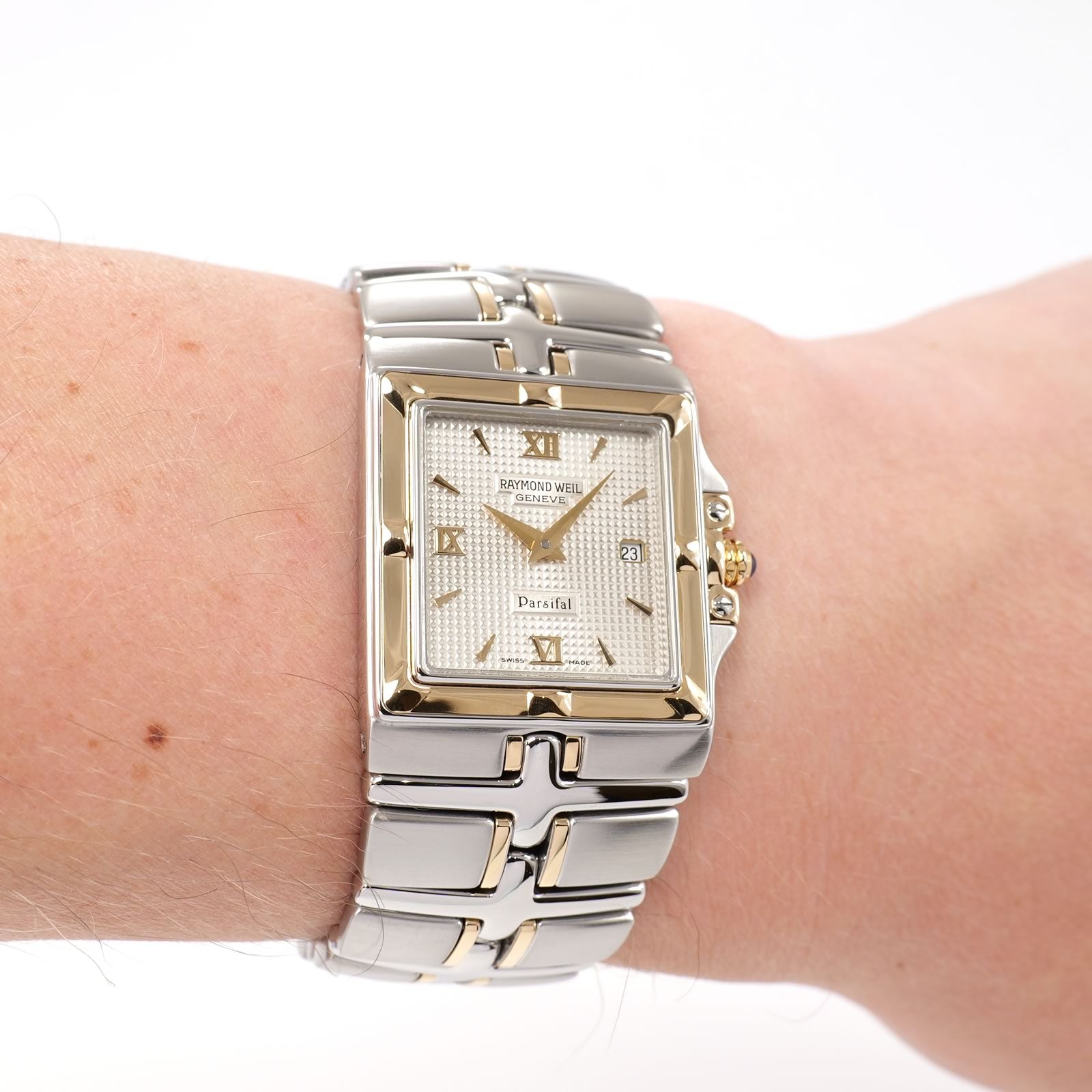 Raymond Weil Parsifal 9390 Men's silver square dial watch with 18k gold on the wrist