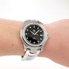 TAG Heuer Link WJ1117-0 Men's Black Dial watch on the wrist