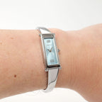 Gucci 1500L Blue Dial Bangle watch on the wrist