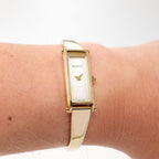Gucci 1500L Ladies White Mother of Pearl 18k Gold Plated watch on the wrist