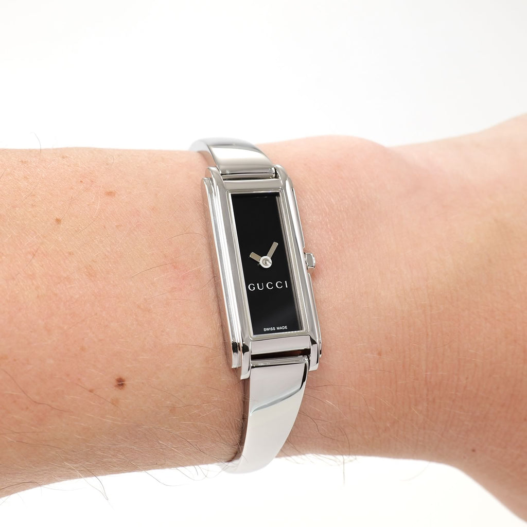 Gucci G-Line 109 Ladies Black Dial Bangle Watch on the wrist