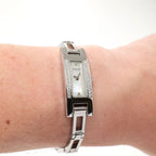 Gucci 3900L Ladies White Mother of Pearl Dial watch on the wrist