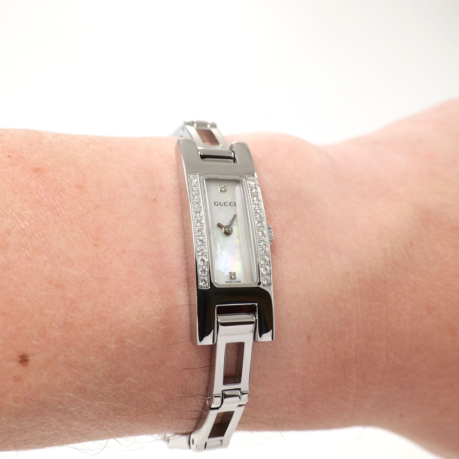 Gucci 3900L Ladies White Mother of Pearl Dial watch on the wrist