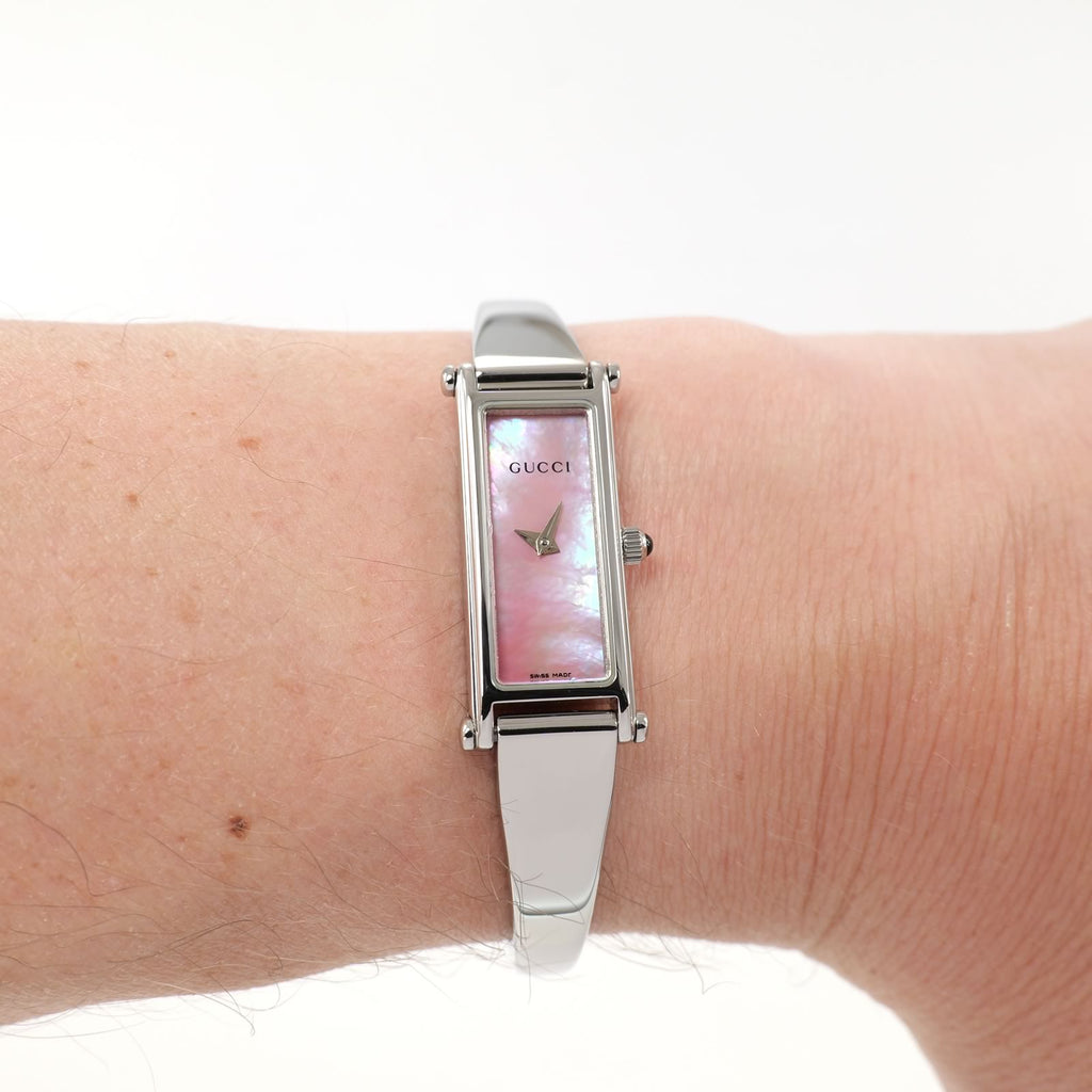 Gucci 1500L Pink Mother of Pearl Bangle watch on the wrist