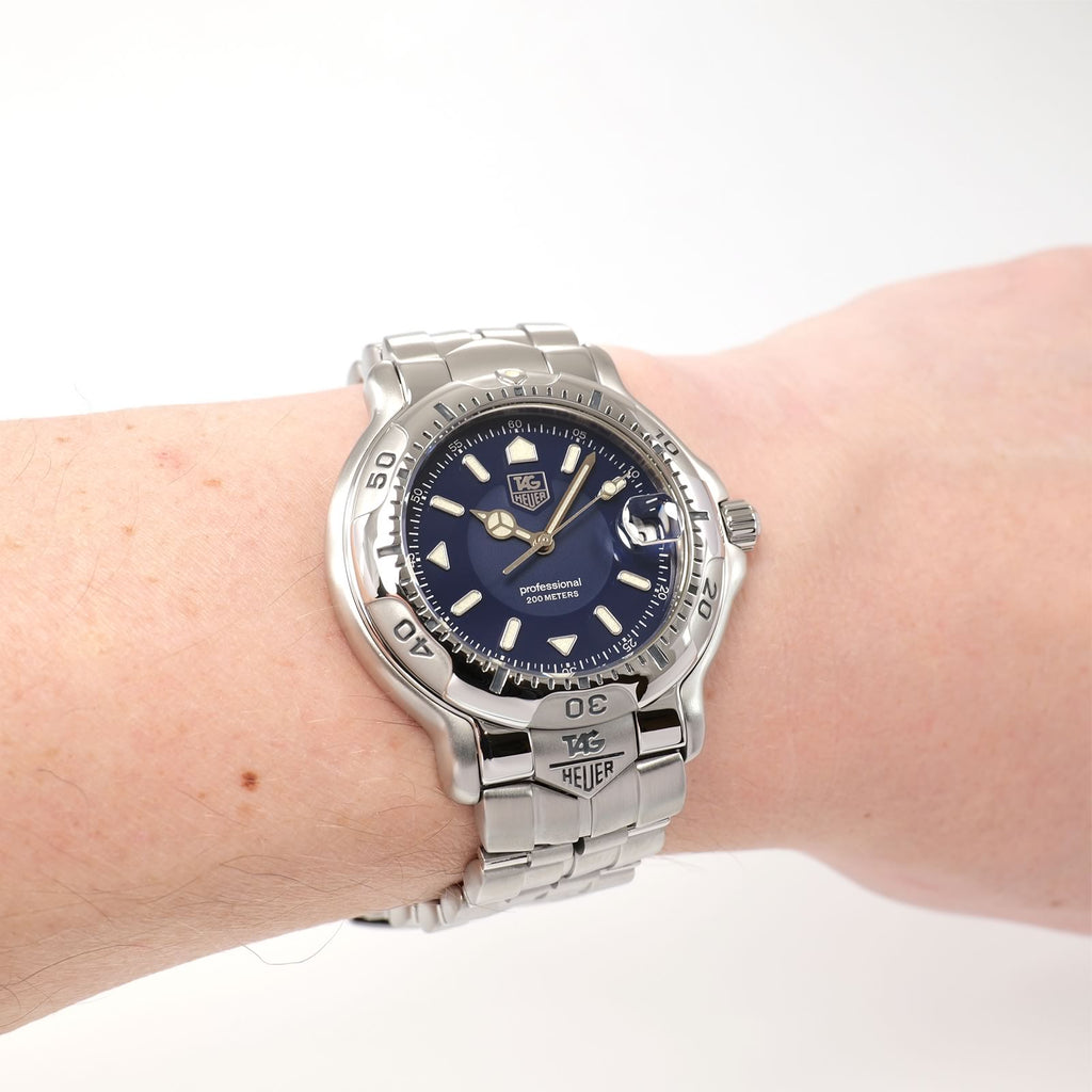 TAG Heuer 6000 Series WH1115-K1 Royal Blue Dial watch on the wrist