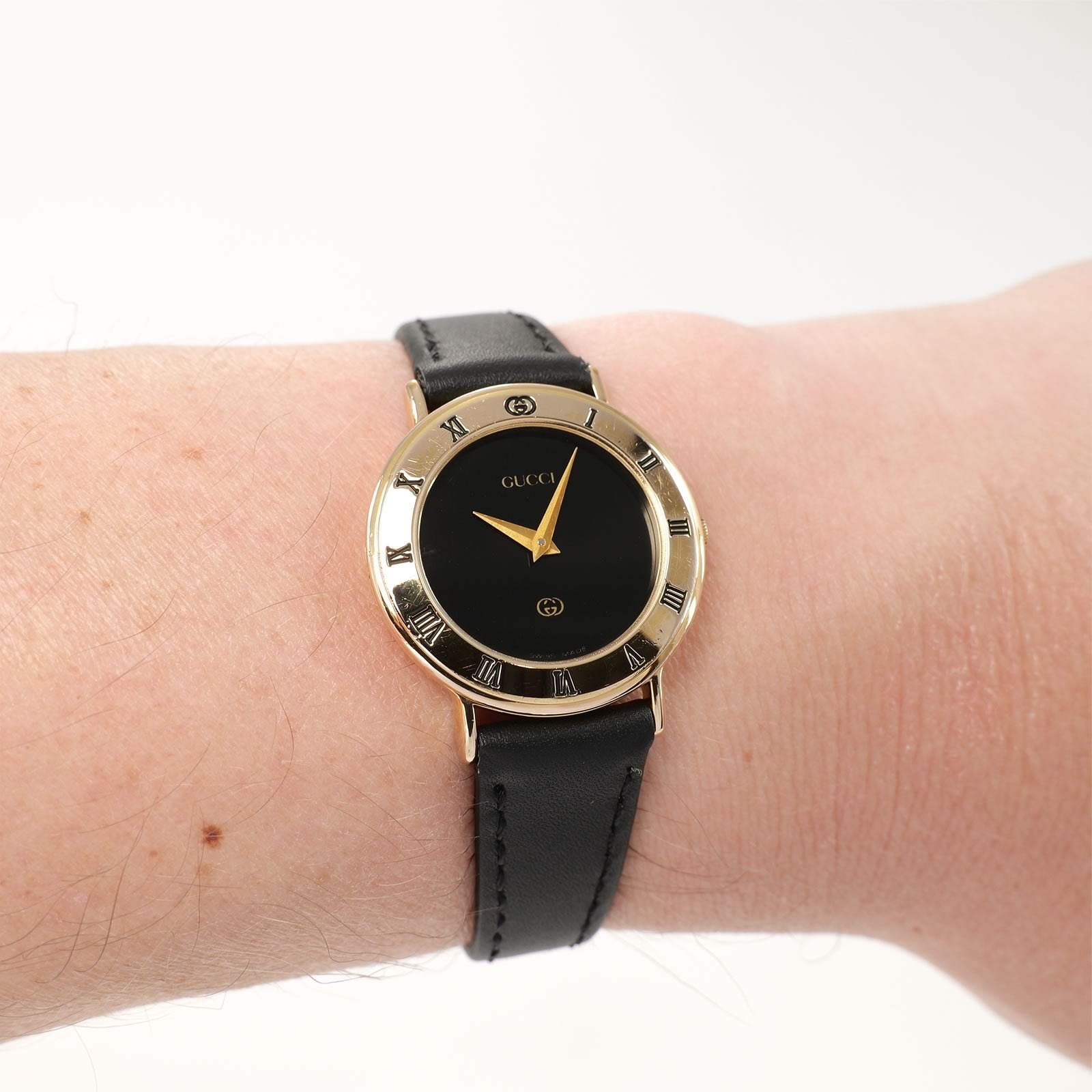 Gucci 3000L Black Dial 18k Gold Plated on the wrist