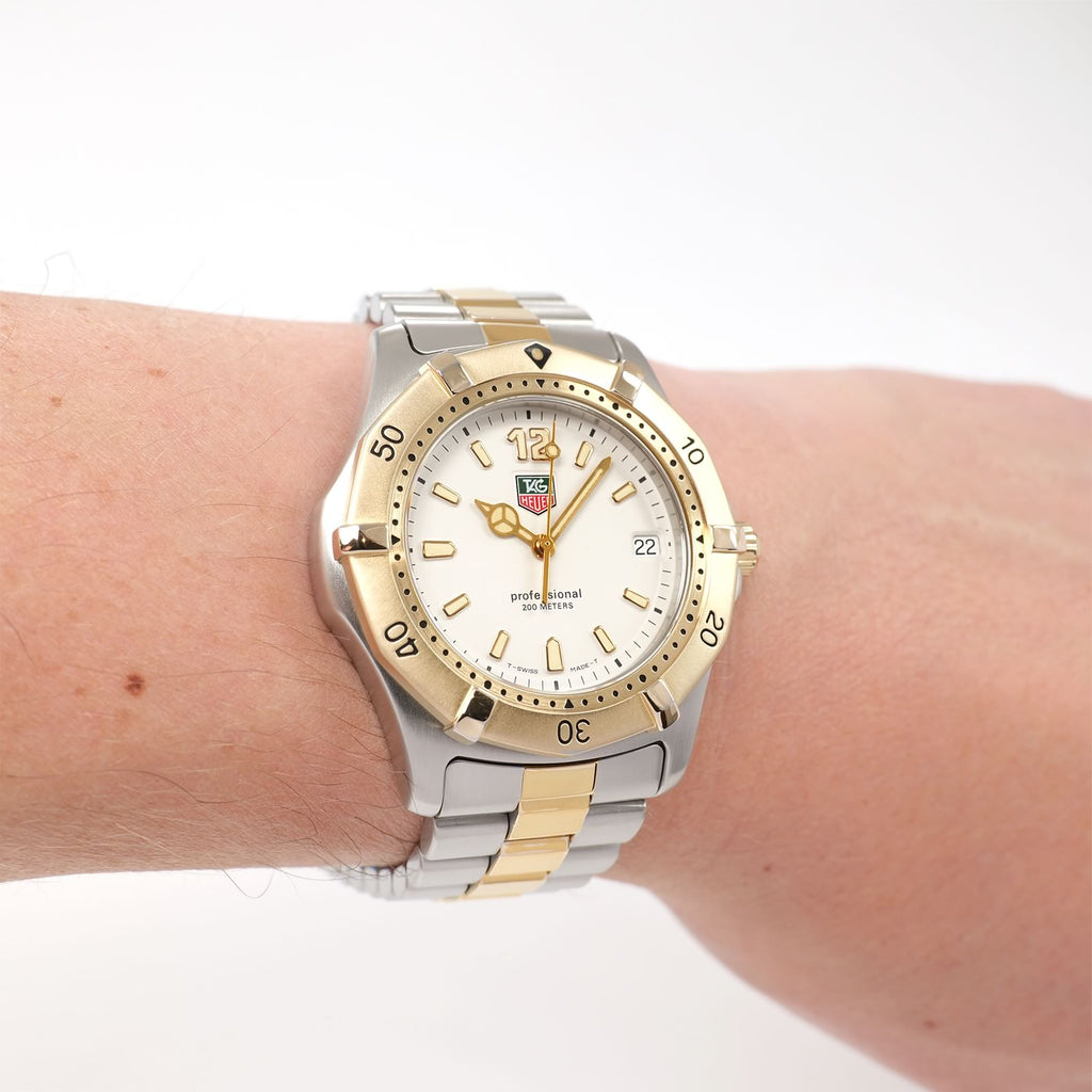 TAG Heuer 2000 WK1121 Men's White Dial Two Tone watch with 18k Gold on the wrist