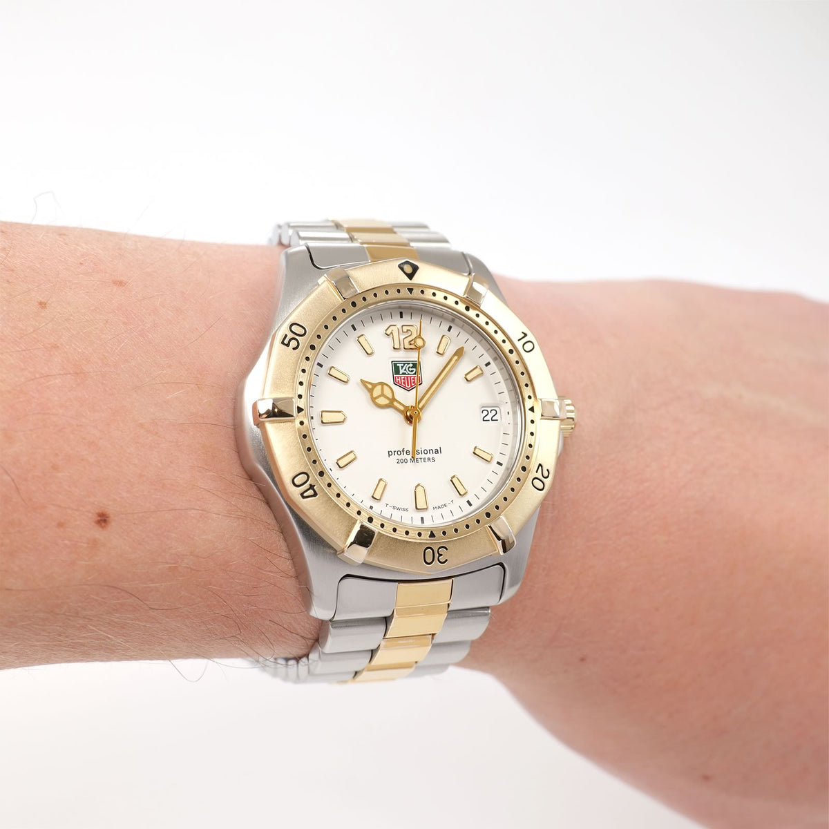 TAG Heuer 2000 WK1121 Men's White Dial Two Tone watch with 18k Gold on the wrist